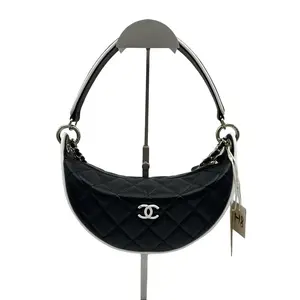 Pre-owned CHANEL hz8 Chain Clutch (commonly known as the "Crescent" or "Half Moon" Hobo bag): Black lambskin body with white piping and champagne gold hardware. h22436