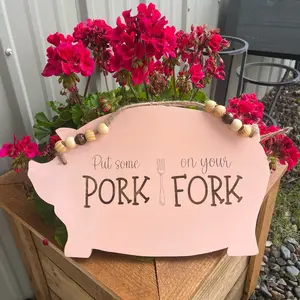 Wooden pig sign for bacon and pork lovers
