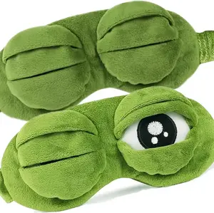 Frog Sleep Mask - A stylish, shimmering sleep mask featuring an adorable Frog design. This fun, plush eye mask is perfect for travel, yoga, napping, and light-blocking; its soft cotton lining gently cares for sensitive skin.