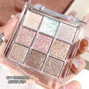 Portable 9-grid colorful glitter eyeshadow. Rich layered shimmer effect with even coloring. Perfect for outlining and brightening eyes, stylish design fits all daily makeup styles.