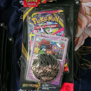 Pokemon TCG Mega Evolution Booster Pack with Promo Card & Coin Includes Drifloon Card and Mega Evolution Coin