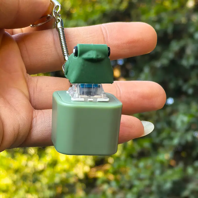 Cute Frog Amphibian Animal Keychain Toy - Rechargeable, Whimsical, Buckle-Attached, Casual Fashion Decoration with Realistic Croaking Sound for Stress Relief Fidgeting
