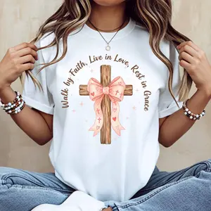 Wooden Cross With Pink Bow And Inspirational Quote Walk By Faith Live In Love Rest In Grace Printed T Shirt White Casual Short Sleeve Top For Everyday Wear And Leisure Activities