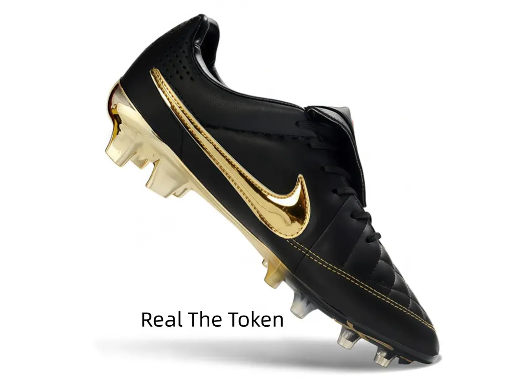 Matte black leather soccer cleats with metallic gold accents, quilted front upper delivers soft precise ball touch, gold molded studs offer stable traction on natural grass for training and matches.