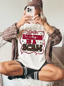 Adulting Is a Scam ~ Unisex Short Sleeve CC Garment Dyed T-Shirt Printed in the USA