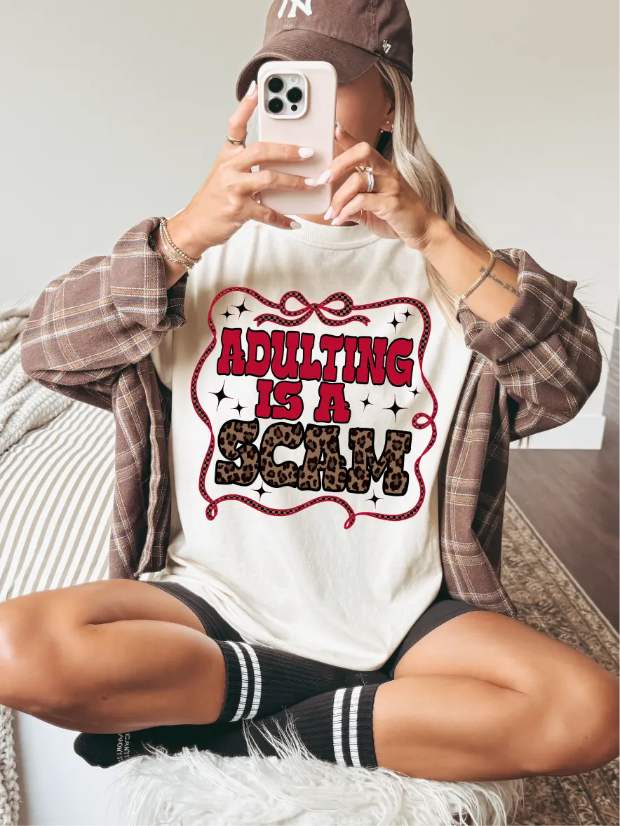 Adulting Is a Scam ~ Unisex Short Sleeve CC Garment Dyed T-Shirt Printed in the USA