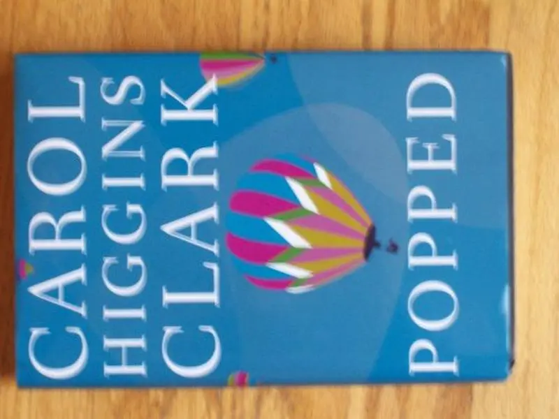 USED Book - Popped (Regan Reilly Mysteries, No. 7) by Carol Higgins Clark (Hardcover) - english