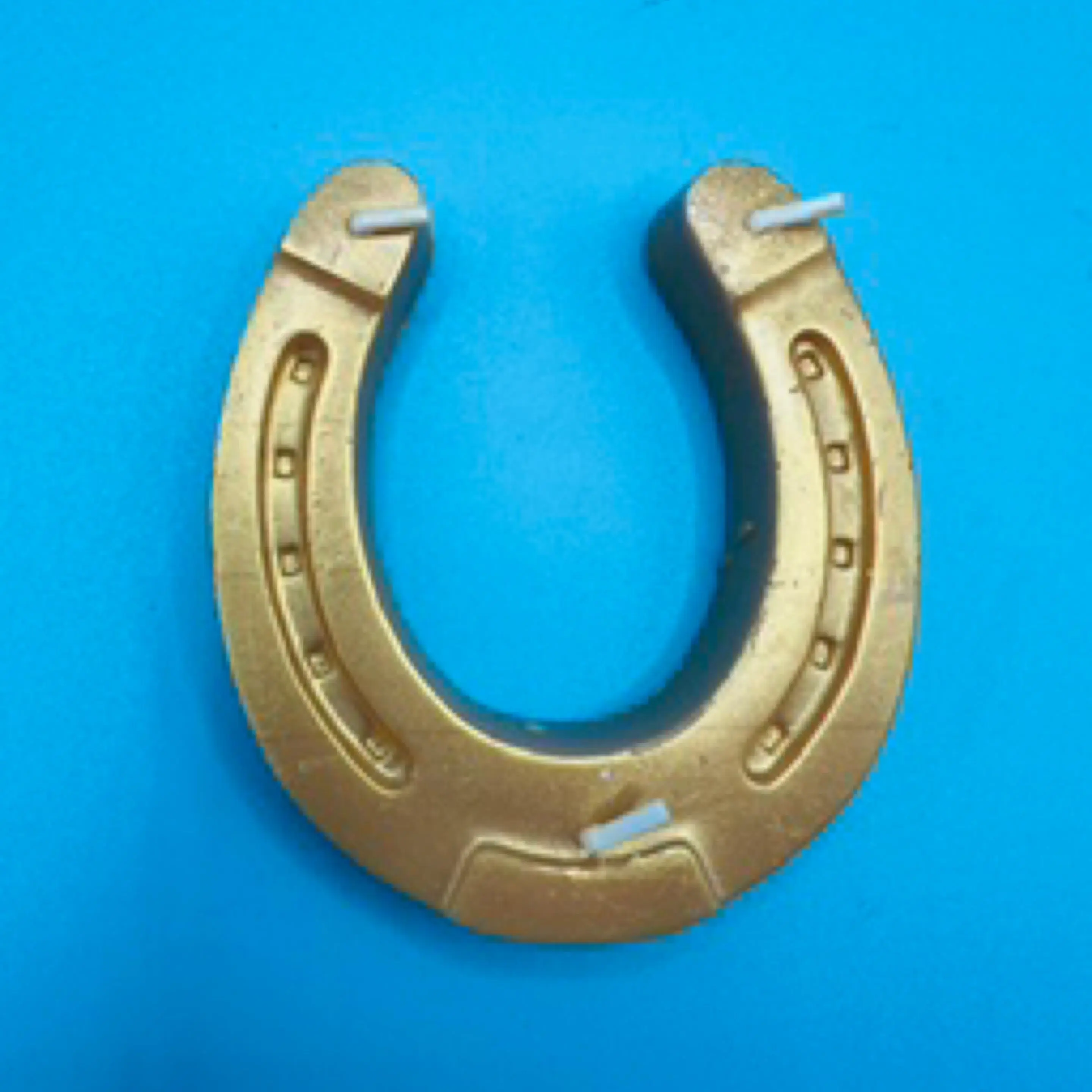 Horseshoe candle gold