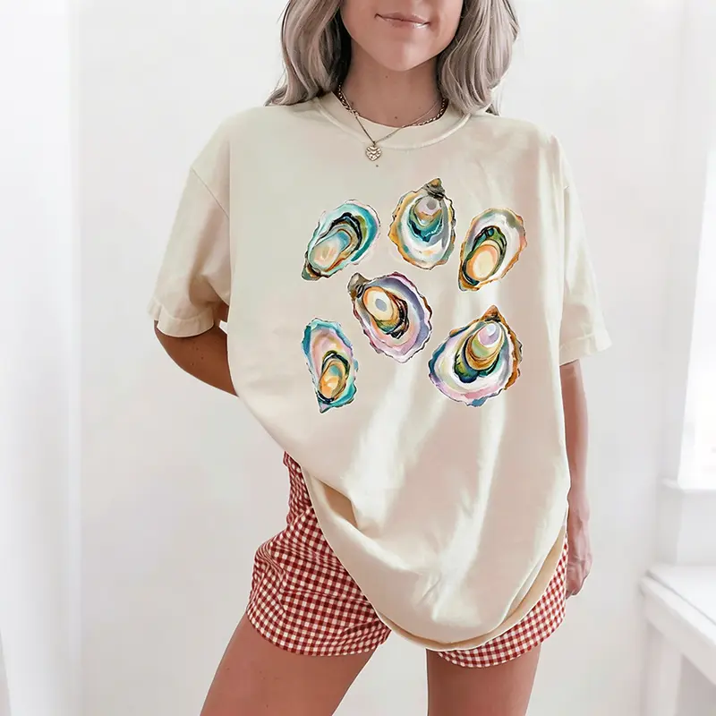 Women's Coastal Aesthetic Casual Oversized T-Shirt - Watercolor Oyster Shell Prints, Loose Comfortable Retro Graphic Top for Beach Lovers
