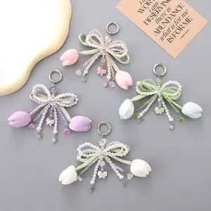 Beautiful, fresh, and sweet pearl tulip hanging decoration accessory with three-dimensional bow keychain and phone charm