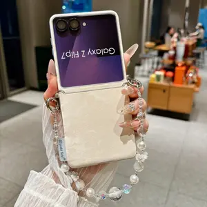 Silver-edged side-clasp landscape painting phone case, with optional detachable fabric strap, Lanyard, compatible with Samsung Galaxy Z Flip 5, 6, 7, 7FE. Protective cover featuring unique design for daily use, durable outer shell