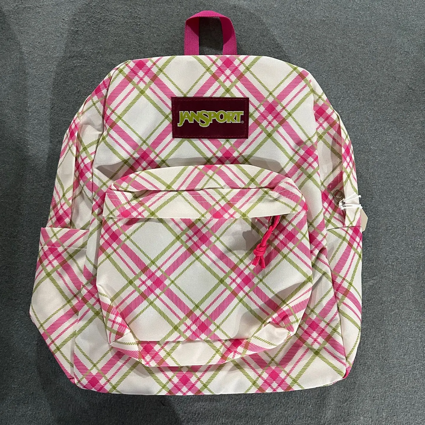 Jansport College Backpack — a large-capacity college backpack with a 15-inch laptop compartment and side water bottle pockets, suitable for students’ everyday use.