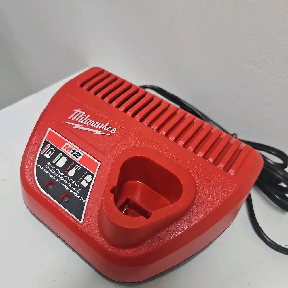 Milwaukee m12 battery charger New Open Box Milwaukee m12 battery charger New Open Box