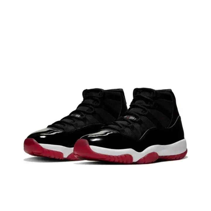 Retro high top basketball sneakers built with glossy patent leather upper, classic black‑red‑white color blocking, iconic high‑top silhouette, great for streetwear fits and modern daily urban outfit styling