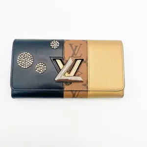 Pre-owned Louis Vuitton leather Small Leather Goods Reverse Monogram Studded Night Lights Twist Wallet