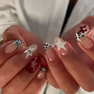 24 pcs of short oval stylish acrylic nails in autumn and winter brown and coffee colors, playful black and white cow pattern, red five-pointed star round pearl flash, large white diamond, sweet and cool girl party, banquet portable fake nails