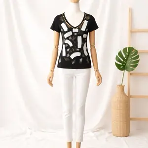 Elegant Black T-Shirt with White Abstract Design and Gold And Silver Trim for Women
