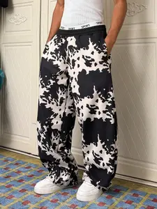 Oversized Cow Print Wide-Leg Sweatpants for Men | Soft Fabric Elastic Waist Casual Pants | Loose Fit Daily Streetwear | Single Piece | Black & White Animal Pattern Style