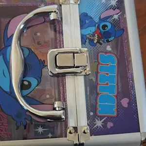 Disney Stitch Train Case Cosmetic Makeup Set Includes Lip Gloss Eyeshadow Nail Polish Hair Accessories for Parties Sleepovers & Makeovers Ages 13+ by Townley Girl