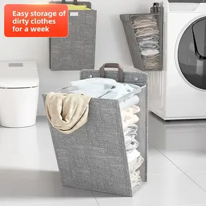 A foldable wall-mounted laundry basket for bathroom use, a household essential for storing dirty clothes