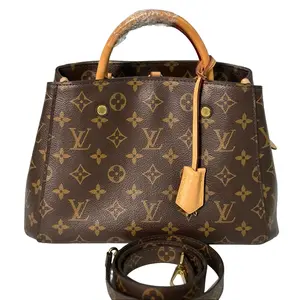 Pre-owned Canvas Crossbody Bags Louis Vuitton Montaigne BB – Monogram Top Handle Bag with Vachetta Leather Trim and Crossbody Strap