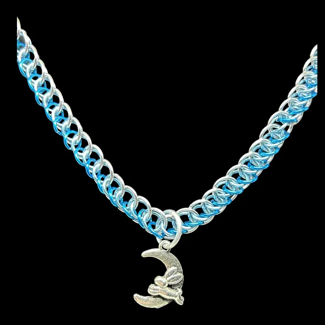 Handcrafted chainmaille in mermaid weave with bunny jumping over the moon pendant