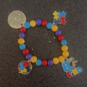 Autism Awareness Bracelet with Colorful Beads and Puzzle Piece Charm for Support and Awareness