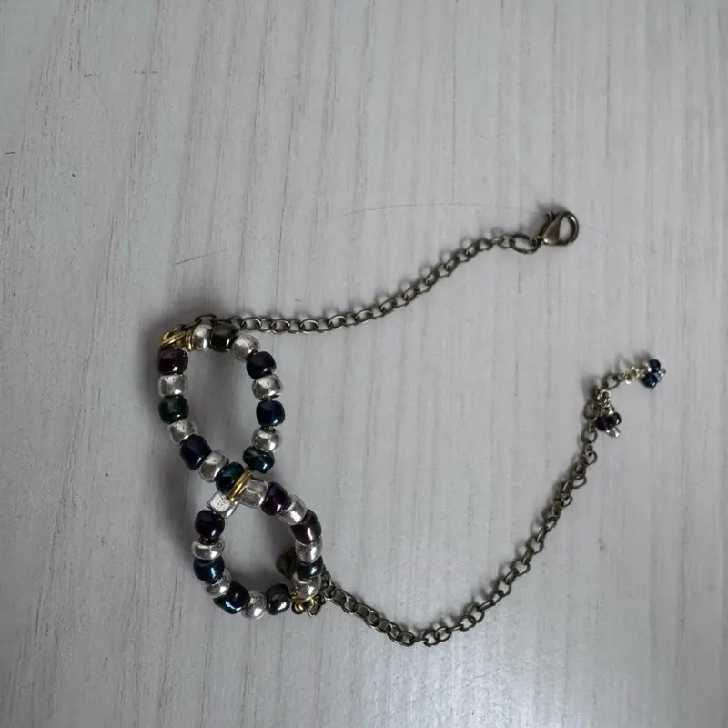 Handcrafted Infinity Symbol Beaded Bracelet – Adjustable Silver & Black Tones
