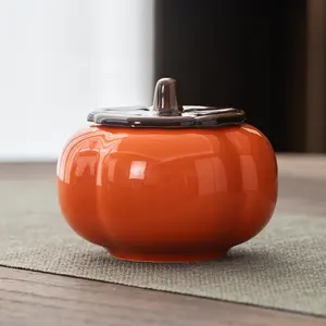 Creative persimmon-shaped ceramic tea canister, personalized and trendy, small size with lid, home use tea table tea set decoration