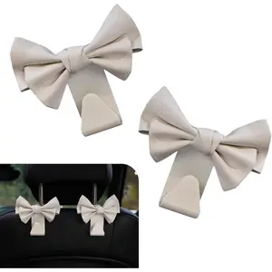 2 count  Seat Headrest Hooks, Cute Bow  Seatback Hook, Multifunctional Auto Interior Purse Hooks Decoration, Universal for   (White)