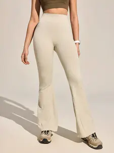 High-stretch ribbed seamless knit high-waist butt-lifting flared yoga casual pants; tummy control for a slimming effect; extended length; micro flare; suitable for spring, summer, and autumn; versatile design.