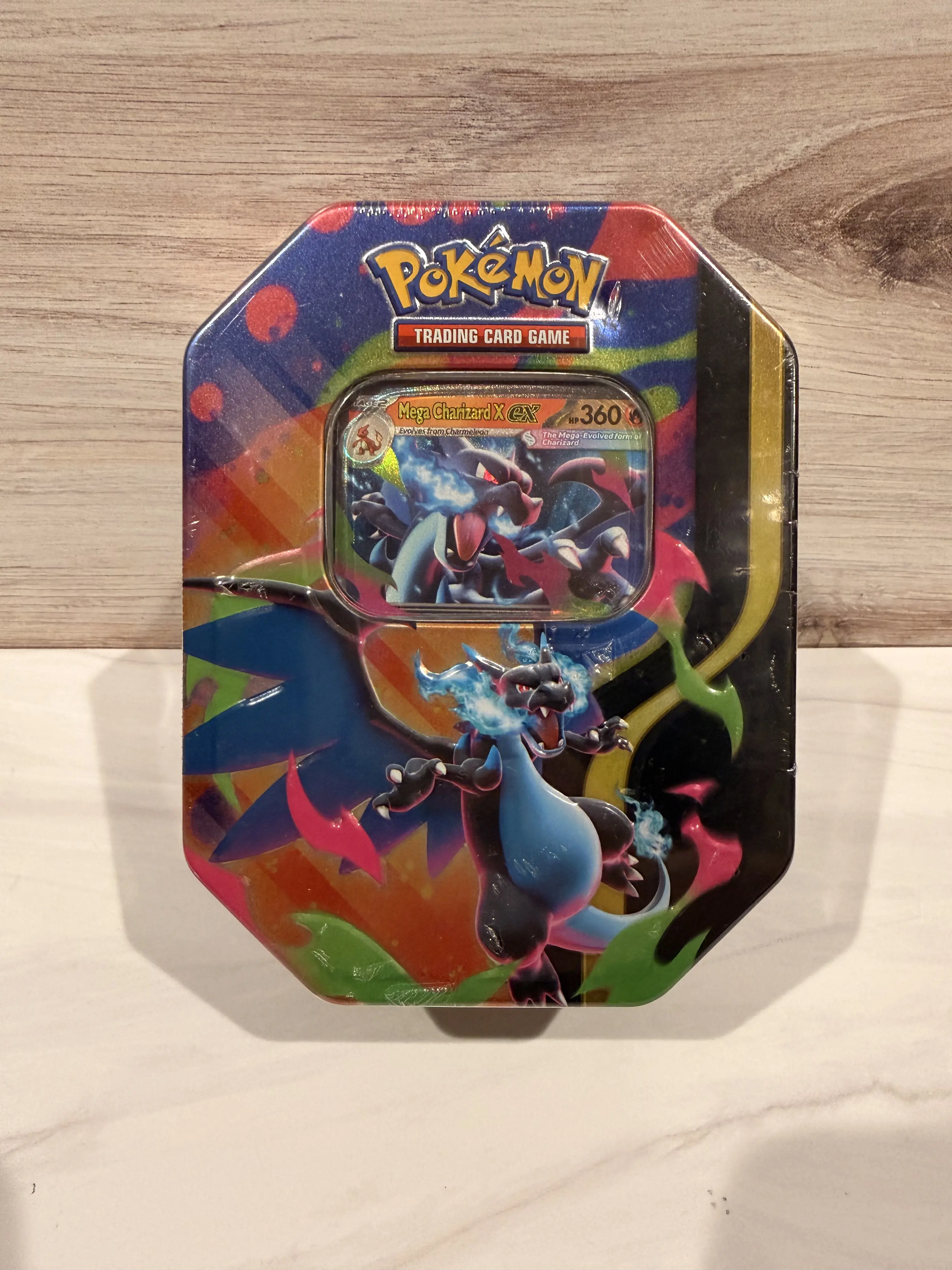 TCG: Mega Evolution — Mega Charizard X ex Tin