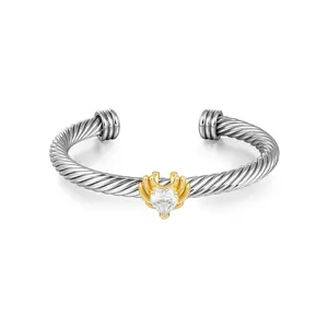 Aprilery Two-Tone Cable Bracelet – Wing & Zircon Design Symbolizing Freedom and Strength
