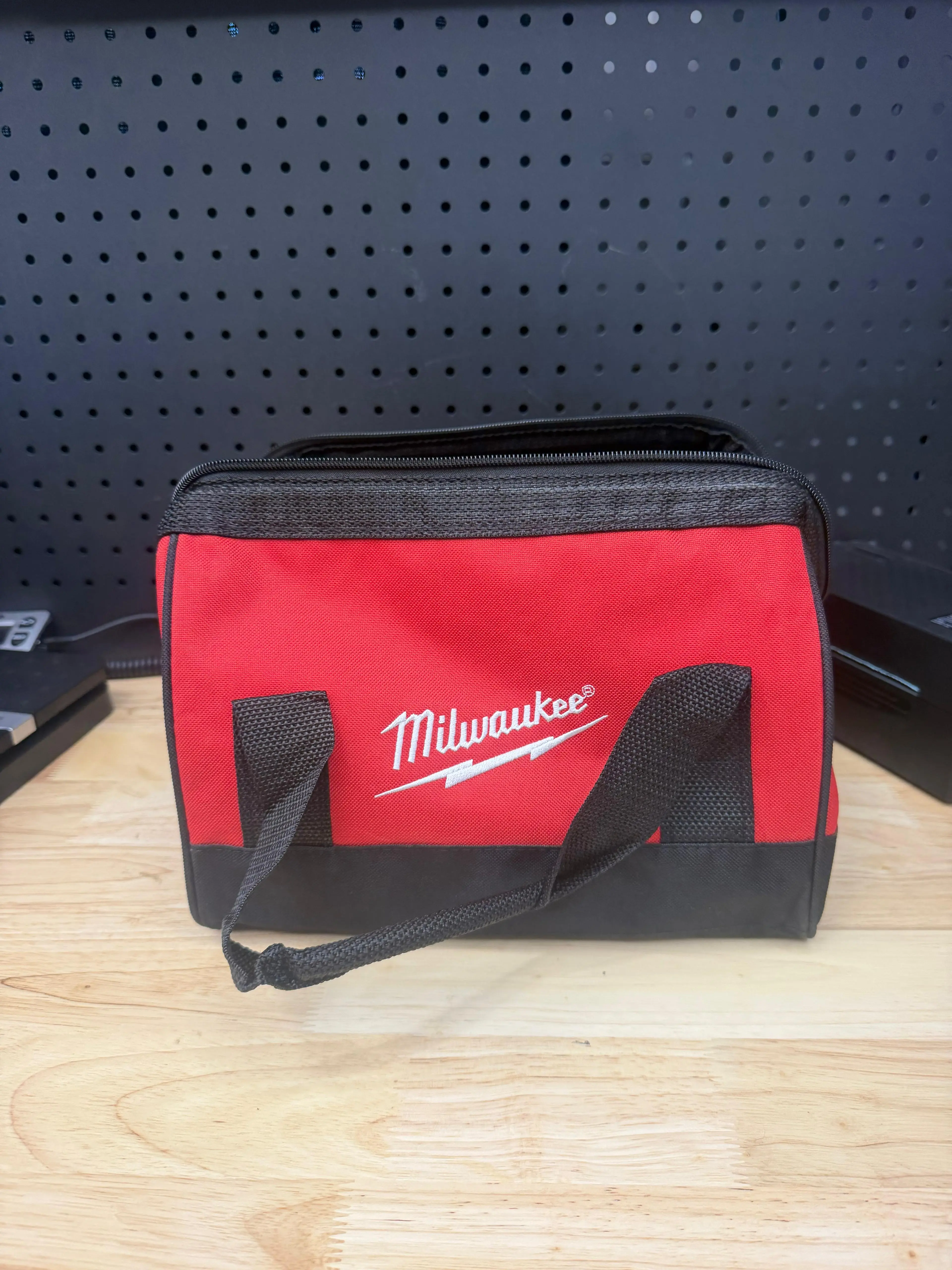 Red & Black Tool Bag with Logo, Durable Design, Ideal for Storage and Organization, Perfect for Tool Enthusiasts