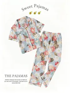 Two-piece women's pajamas, featuring a floral-print short-sleeved shirt pajama top paired with elasticated long pants pajama bottoms, making it a comfortable and versatile home wear set. It's a must-have pajama set for New Year gifts and Valentine's Day