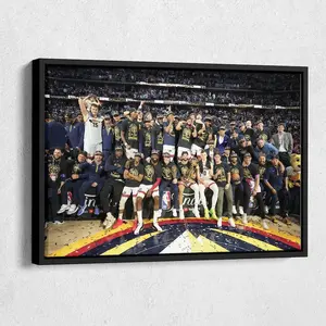 The Denver Nuggets celebrate with the NBA Championship Trophy poster