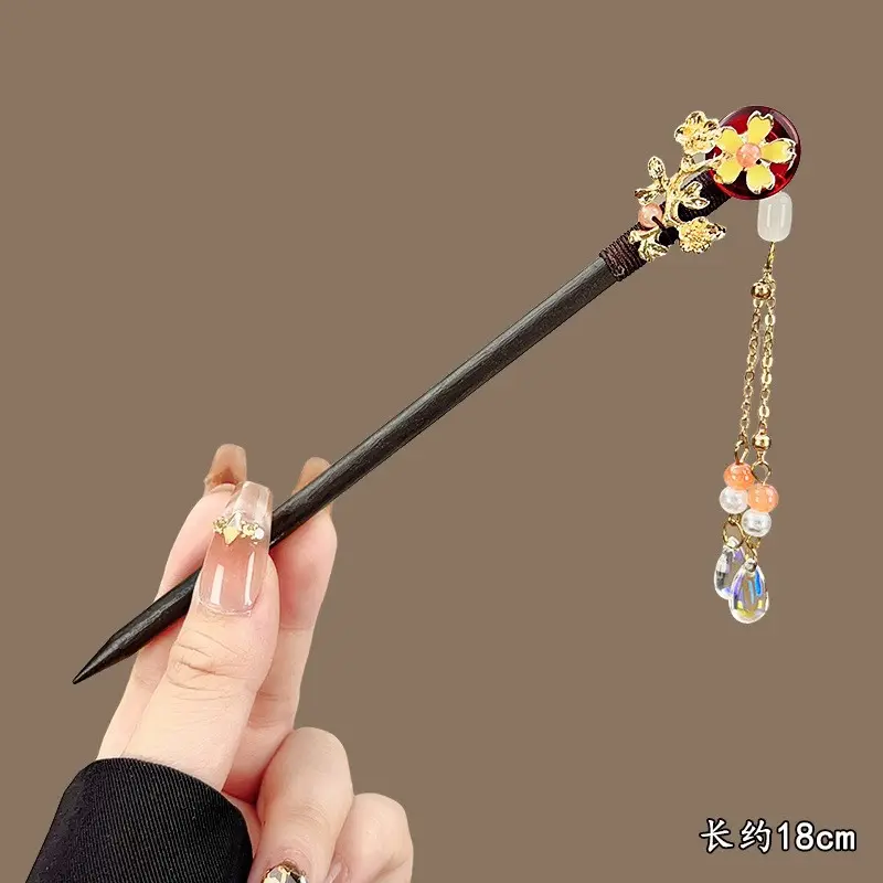 Red jade ring plum branch crystal