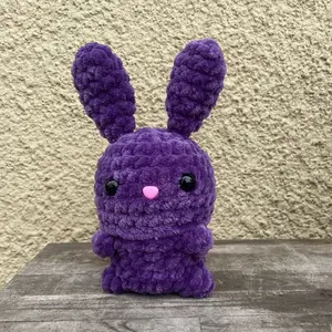 Hand crocheted bunny stash jars.