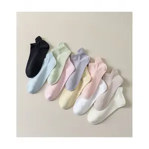 Premium women's ankle socks with solid color and cute cartoon design, perfect for daily and sports wear.