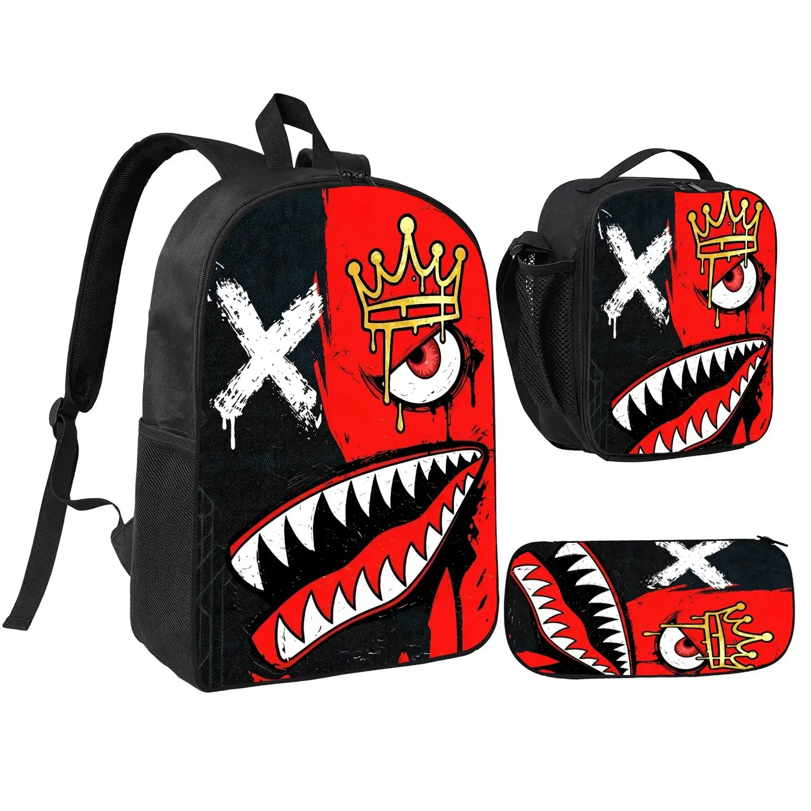 Edelweiss Shark-Print Backpack Set (Black & Red)—includes a matching lunch bag and pencil case; features a striking black-and-red graffiti print combining shark teeth, a crowned eye, and an "X" motif; ideal for school or daily commutes.