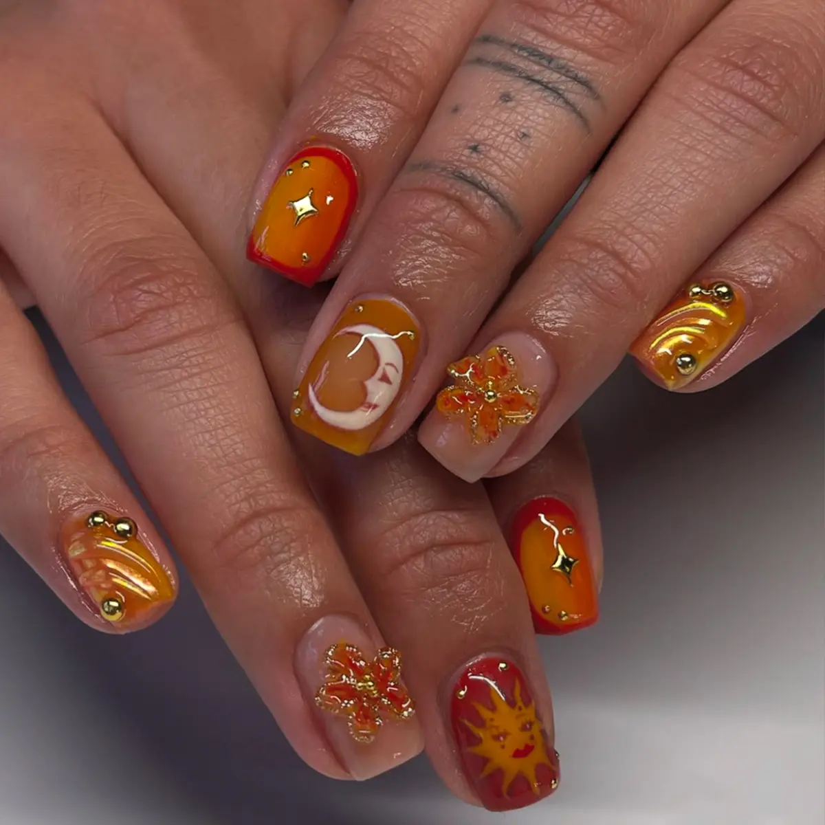 24 pcs of square press on nails hot gold Sun Totem Sweet cool orange-red transition hibus flower gold starmount funny face graffiti Moon goddess gold small steel ball girl gift, party portable fake nail with jelly glue 1 piece file strip 1
