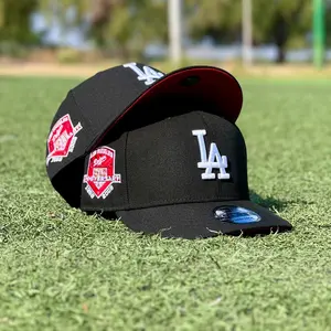 New Era 9FIFTY LA Dodgers Snapback – Black Adjustable Cap with White LA Logo & 50th Anniversary Side Patch