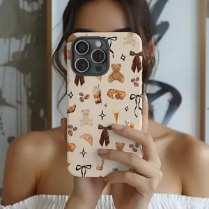 This durable, shock-absorbing, glossy 2-in-1 phone case features a girly beige-brown bear patchwork design. It's compatible with iPhone 17, 16, 15, 14, 13, 12, 11, X, and Samsung models. A perfect holiday gift for friends or family.