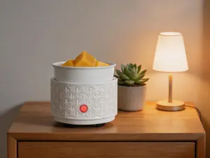 Ceramic wax warmer for home fragrance diffusion. Suitable for scented wax melts, candles and essential oils. A thoughtful gift option for women.