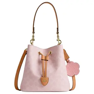COACH Rowan 21 Bucket Bag with Removable Strap in Signature Canvas and Pink for Women