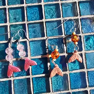 You pick cute mermaid earrings clay with beads