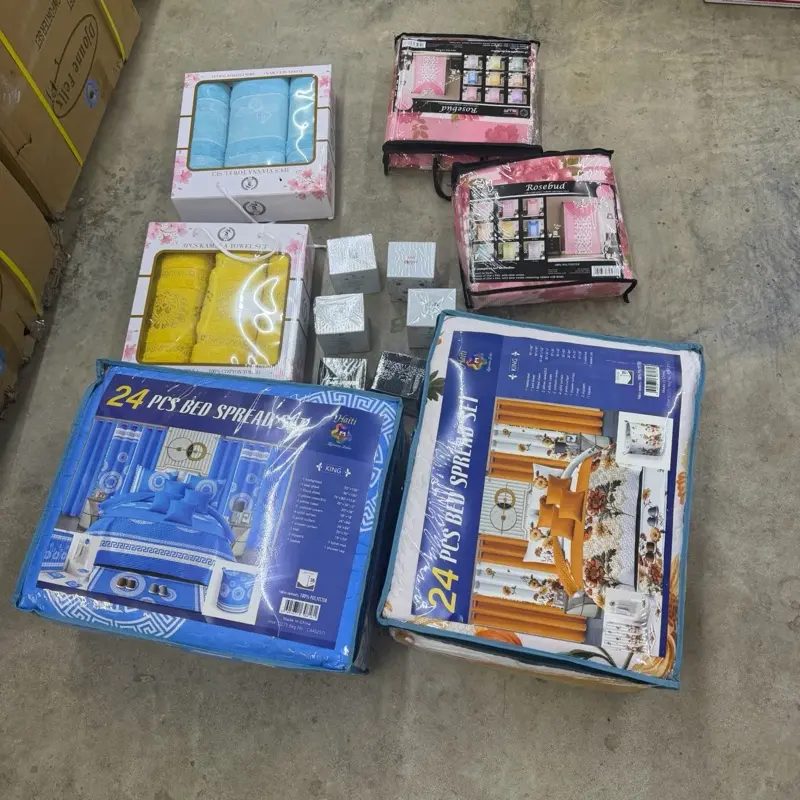 Mercedes boxes sale contain   2 bedspread 24 pieces different color  6 towels 2 pieces of curtain 6 perfum 1 panties 1 bous for gift