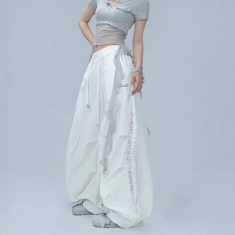 Ballet-inspired ethereal women’s chiffon wide-leg parachute pants with ruffle detailing and lace panels, elastic waistband with adjustable drawstring, cuffed ankles, loose fit, Y2K sweet and elegant, lightweight for everyday casual wear, floor-length.