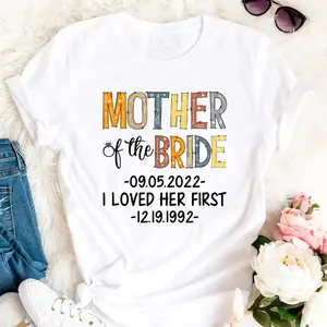 Women's wedding celebration, mother of the bride Graphic T-Shirt - Short Sleeve Crew Neck Regular Fit Casual Wear | Soft & Breathable Fabric, Durable Print, Everyday Comfort, Machine Washable, casual and celebratory flat lay with wedding-related