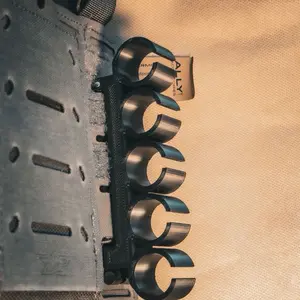 SHOTTY X5 – MOLLE-Mounted 12-Gauge Shell Carrier SHOTTY X5 – MOLLE-Mounted 12-Gauge Shell Carrier